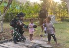 Satgas Yonif 645/GTY Bagikan Al-Kitab dan Pakaian Layak Pakai di Kampung Lama Distrik Elelim